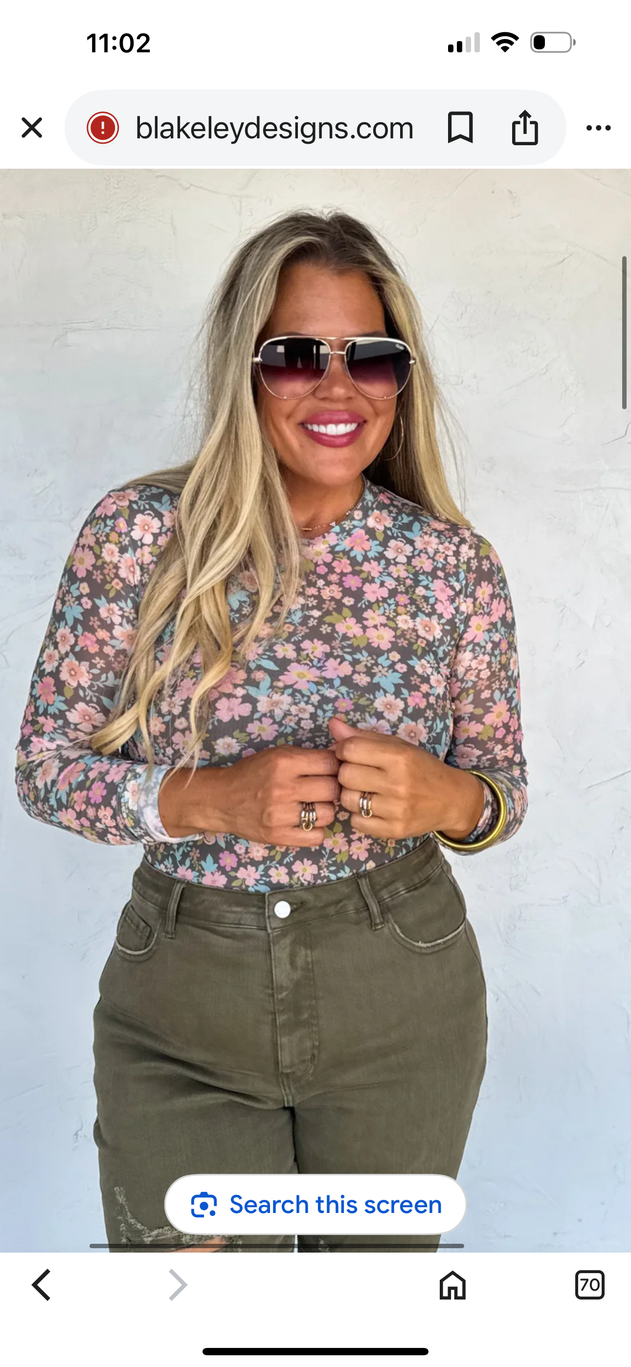 Faded blue flower mesh top